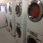 eight LG stacked washer dryers